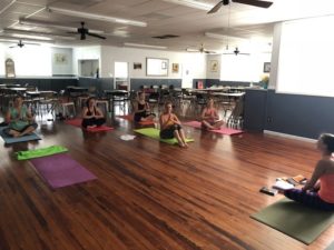 Photo of members doing Yoga at clubhouse