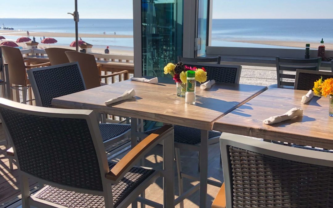 Photo of outdoor seating by beach