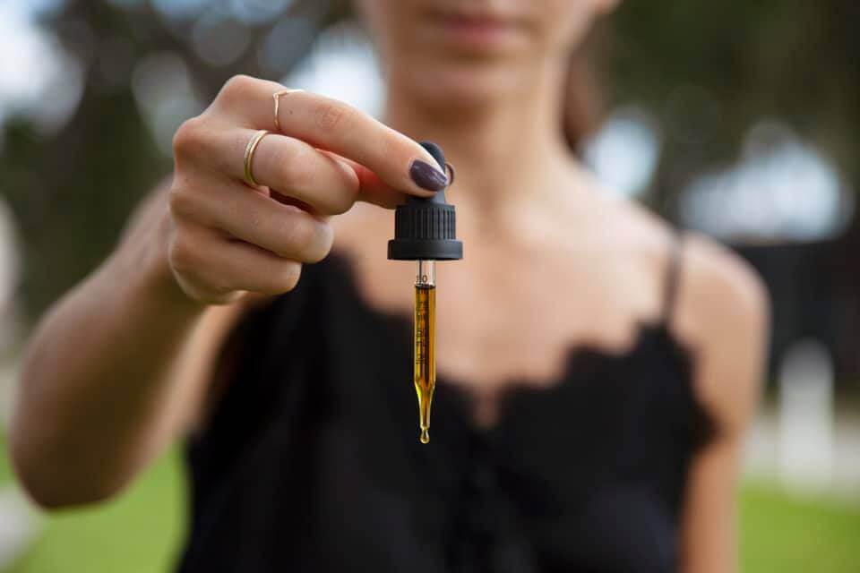 Woman with dropper